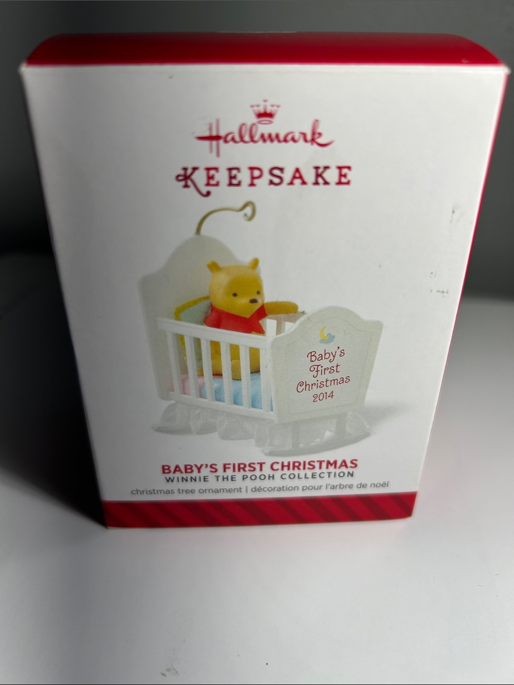 Hallmark Keepsake Winnie the Pooh 2014 Ornament “Baby’s First Christmas” in crib